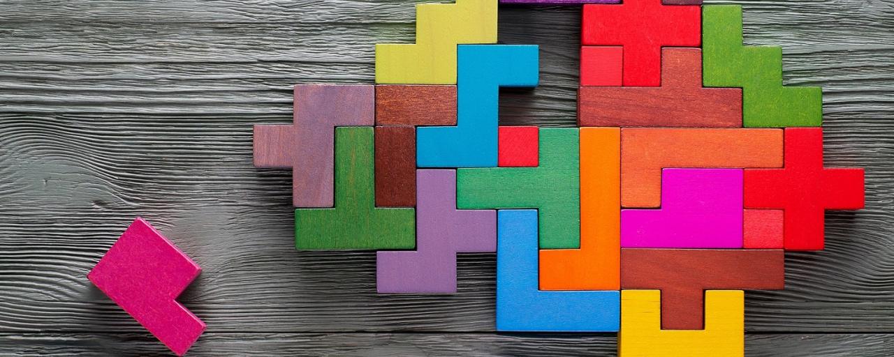 Puzzle pieces form shape of a brain