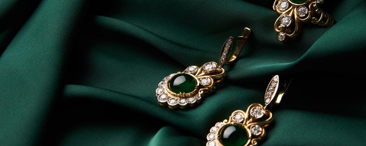 luxury high-end jewellery against a dark green cloth