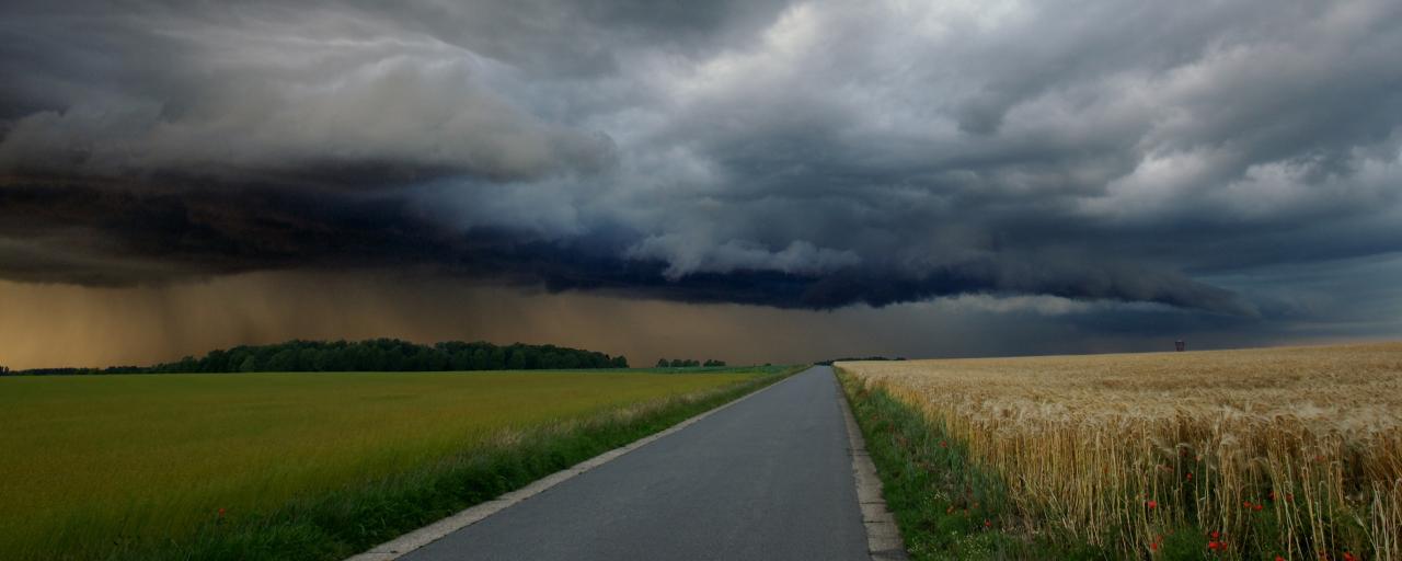 Stormy skies uncertain road